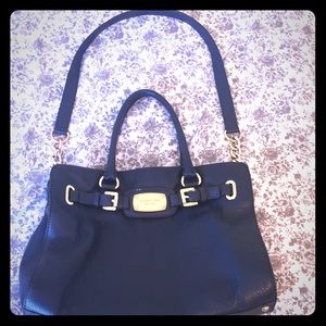 Navy Michael Kors purse.